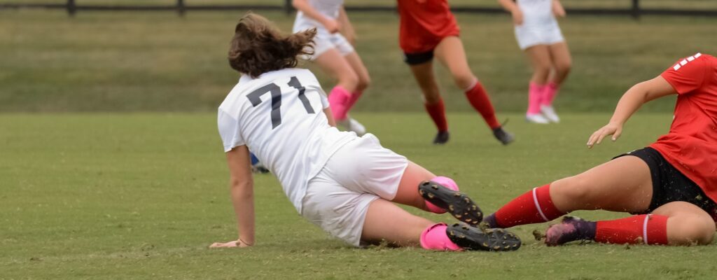Teenage Girl Tackles During Soccer Game